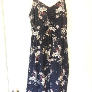 Navy and floral sundress with adjustable spaghetti straps and pockets!